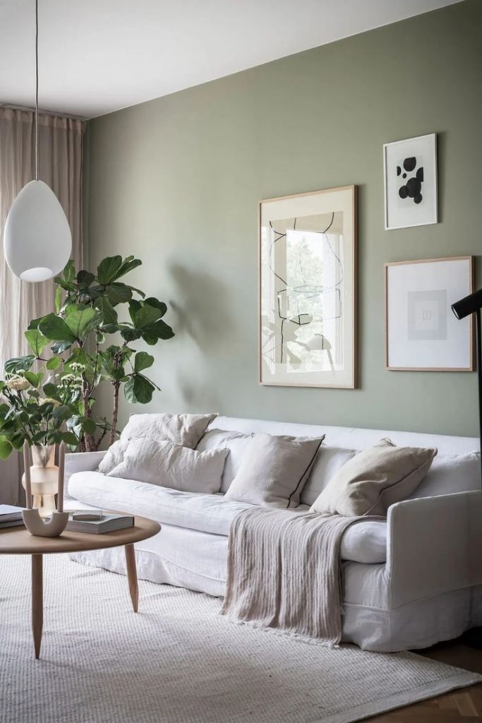 Minimalist Living Room With Sage Green Walls COCO LAPINE DESIGN 683x1024 